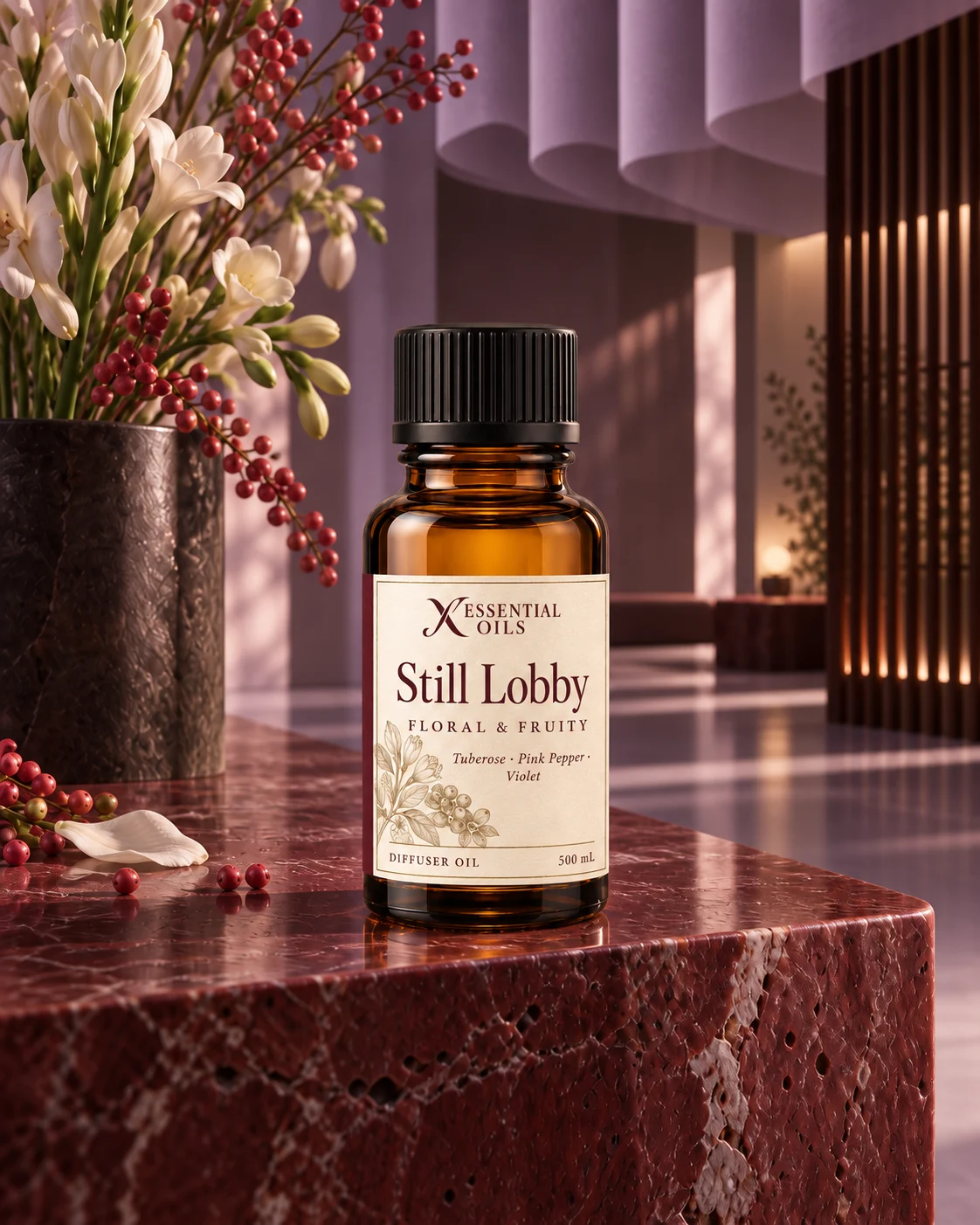 Still Lobby oil bottle on an oxblood stone bench beneath soft lilac folds, with tuberose and pink pepper branches.